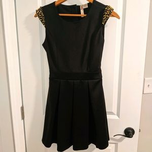 Black dress with gold beaded shoulder